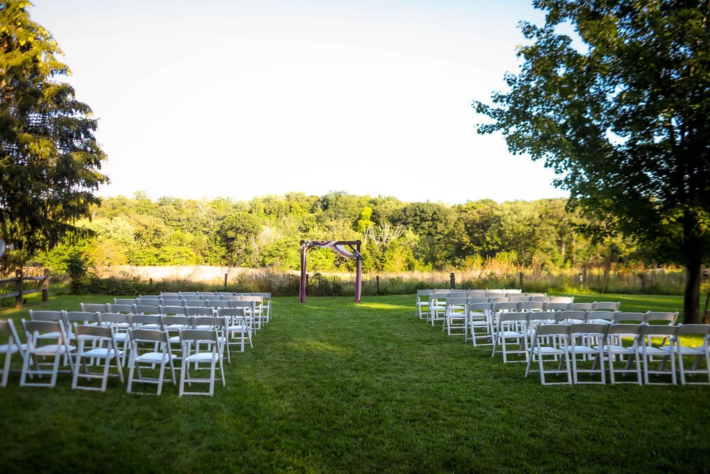 Wedding ceremony setup for Dutch Barn Wedding at Walden Riverside Farm